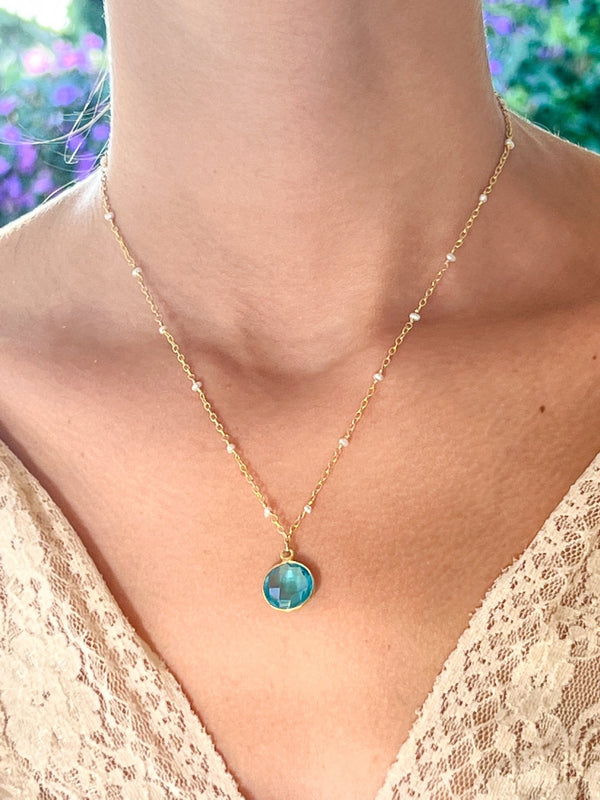 Electric Blue Topaz Charm Drop Necklace on Gold Chain with Freshwater Pearls by Sage Machado - The Sage Lifestyle